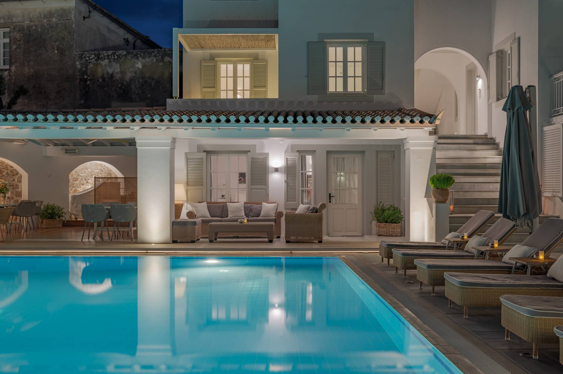The main swimming pool of Zoe's Club Hotel frames the guest experience staying in our elegant Spetses accommodation options