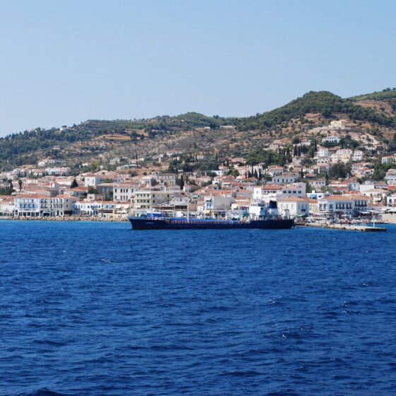 Things to do in Spetses, Greece include exploring the the main port, pictured here as you approach it from the sea
