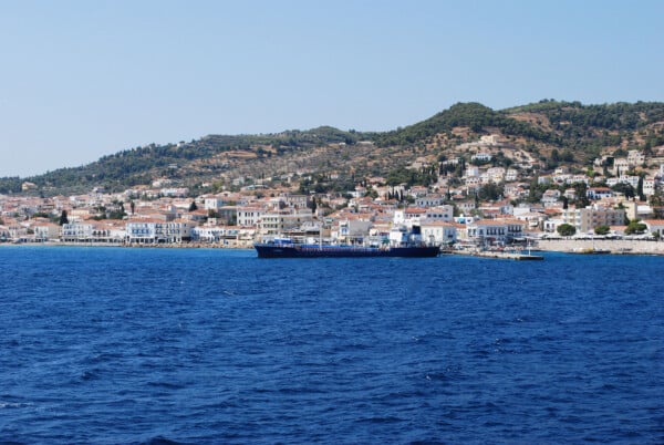 Things to do in Spetses, Greece include exploring the the main port, pictured here as you approach it from the sea